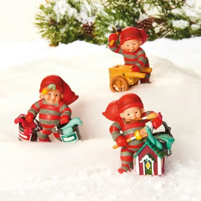 Bäbistomte förbereder julklappar Billig